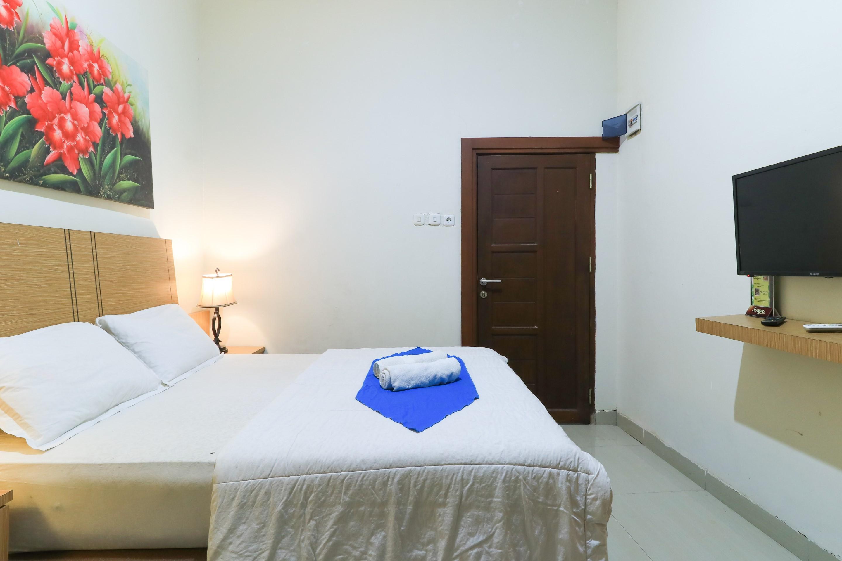 Labuana Homestay & Cafe Garden Makassar Buitenkant foto
